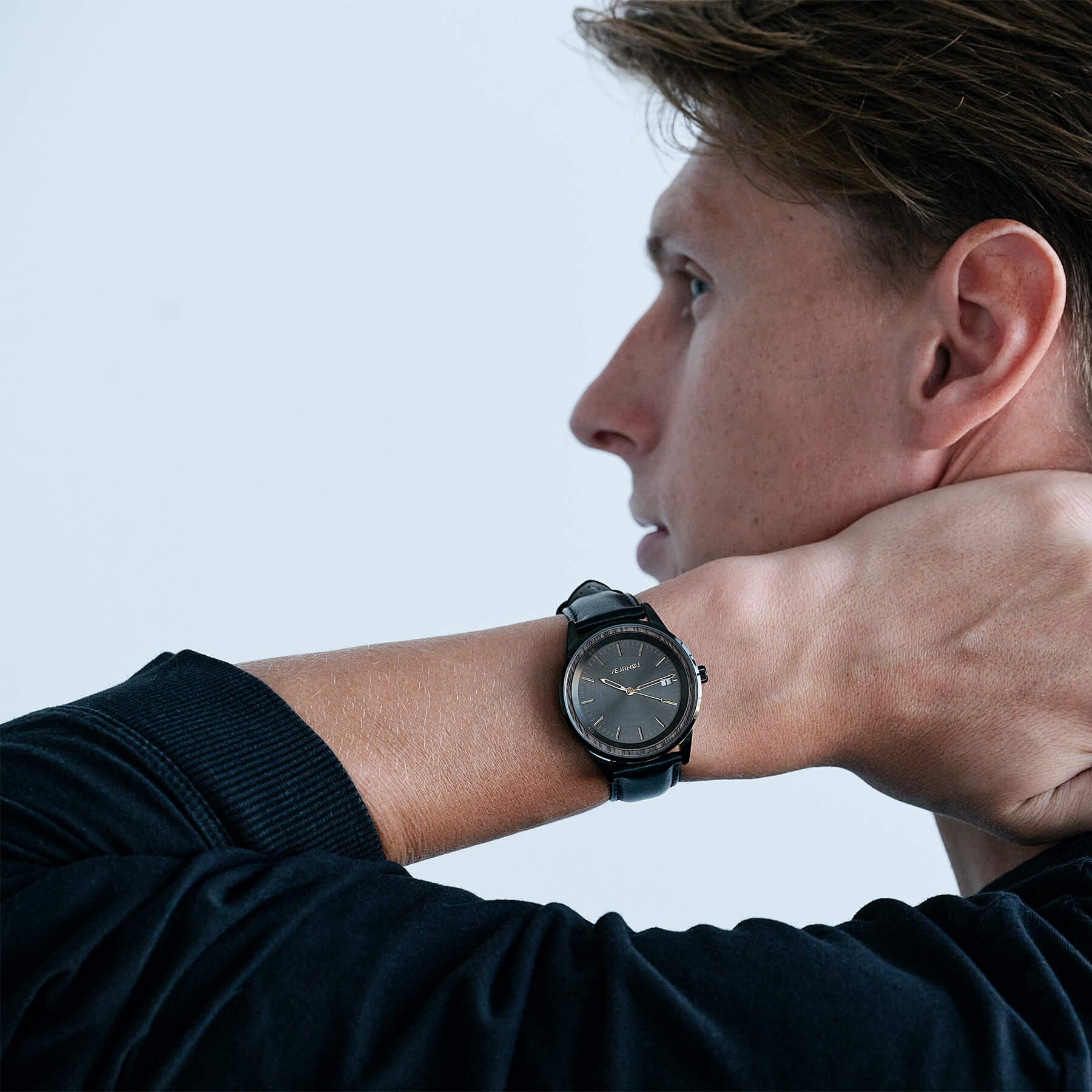 Footballer Kasper Junker wearing the black automatic watch by the VEJRHOJ brand