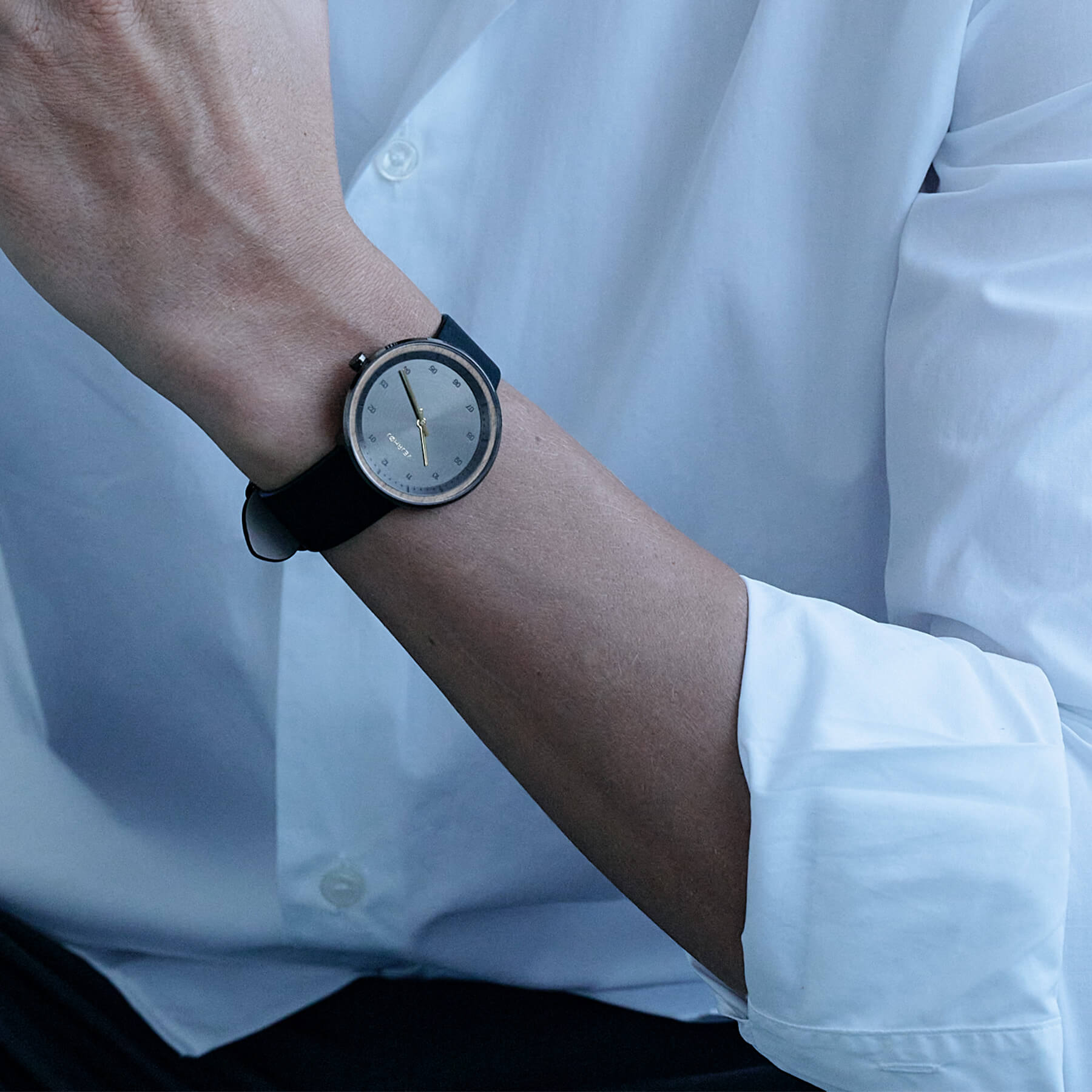 Black stylish watch with white shirt