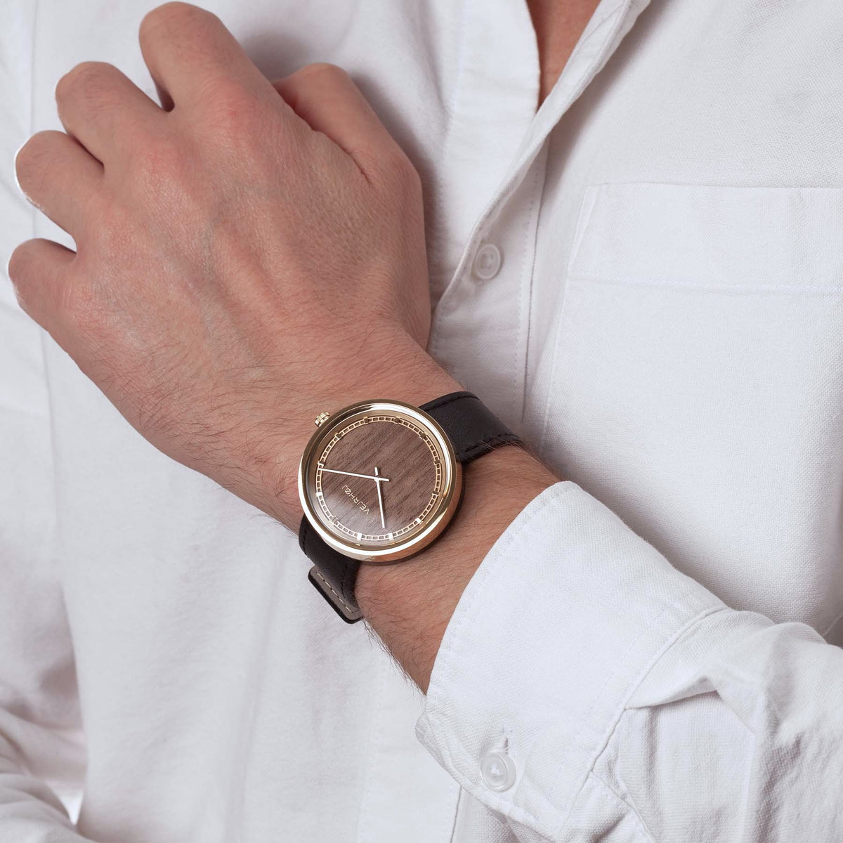 elegant wood watch with walnut wood on hand from VEJRHØJ