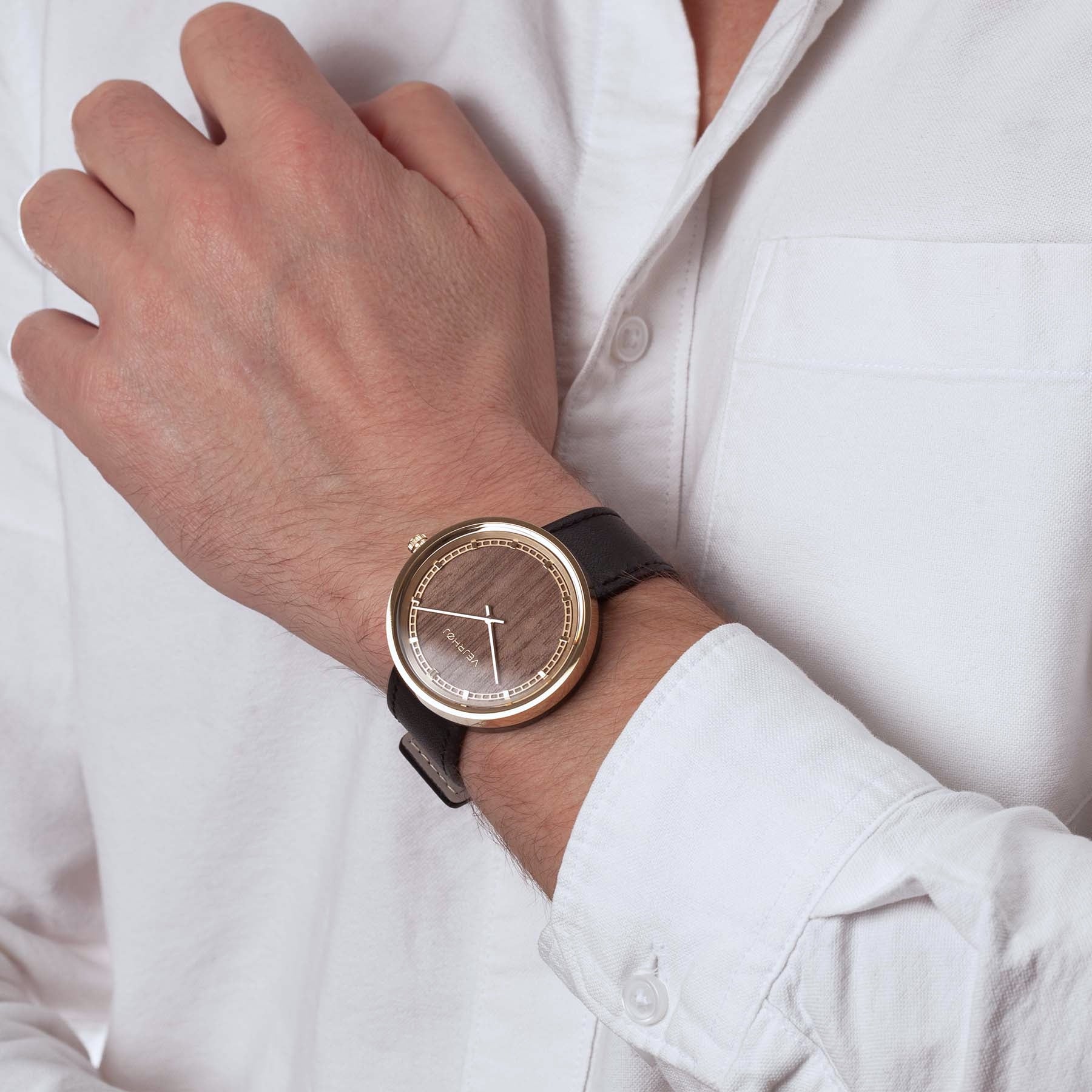 elegant wood watch with walnut wood on hand from VEJRHØJ