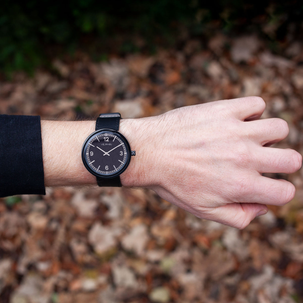 Black and silver elegant watch with numbers on hand from VEJRHØJ