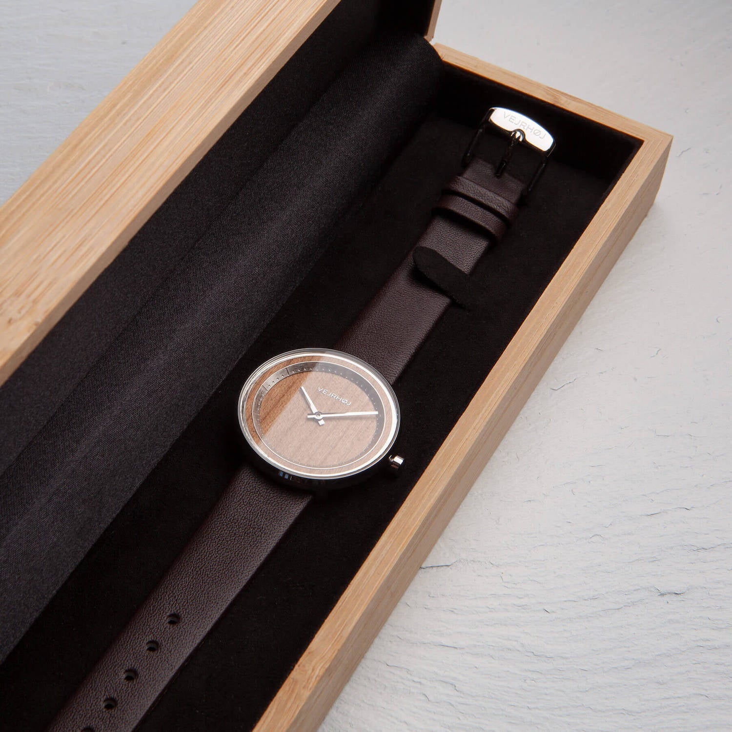 wood watch made from cherry tree for women, placed in wooden box