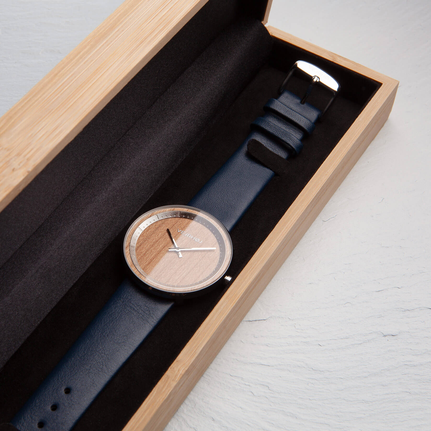 Cherry wood watch with a blue strap