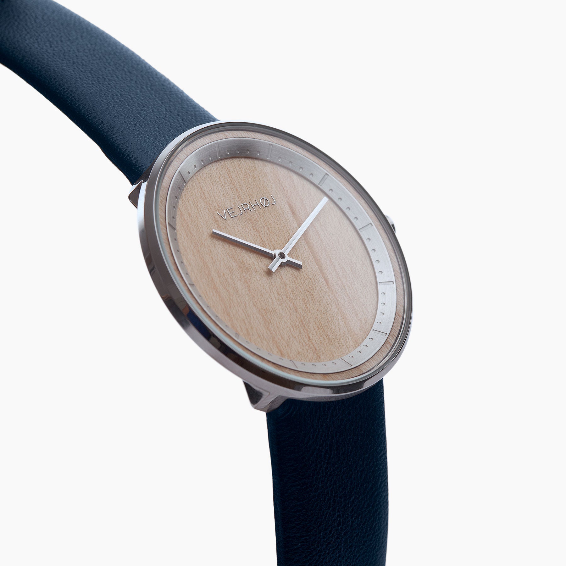 Simple wooden watch with steel casing and silver hands